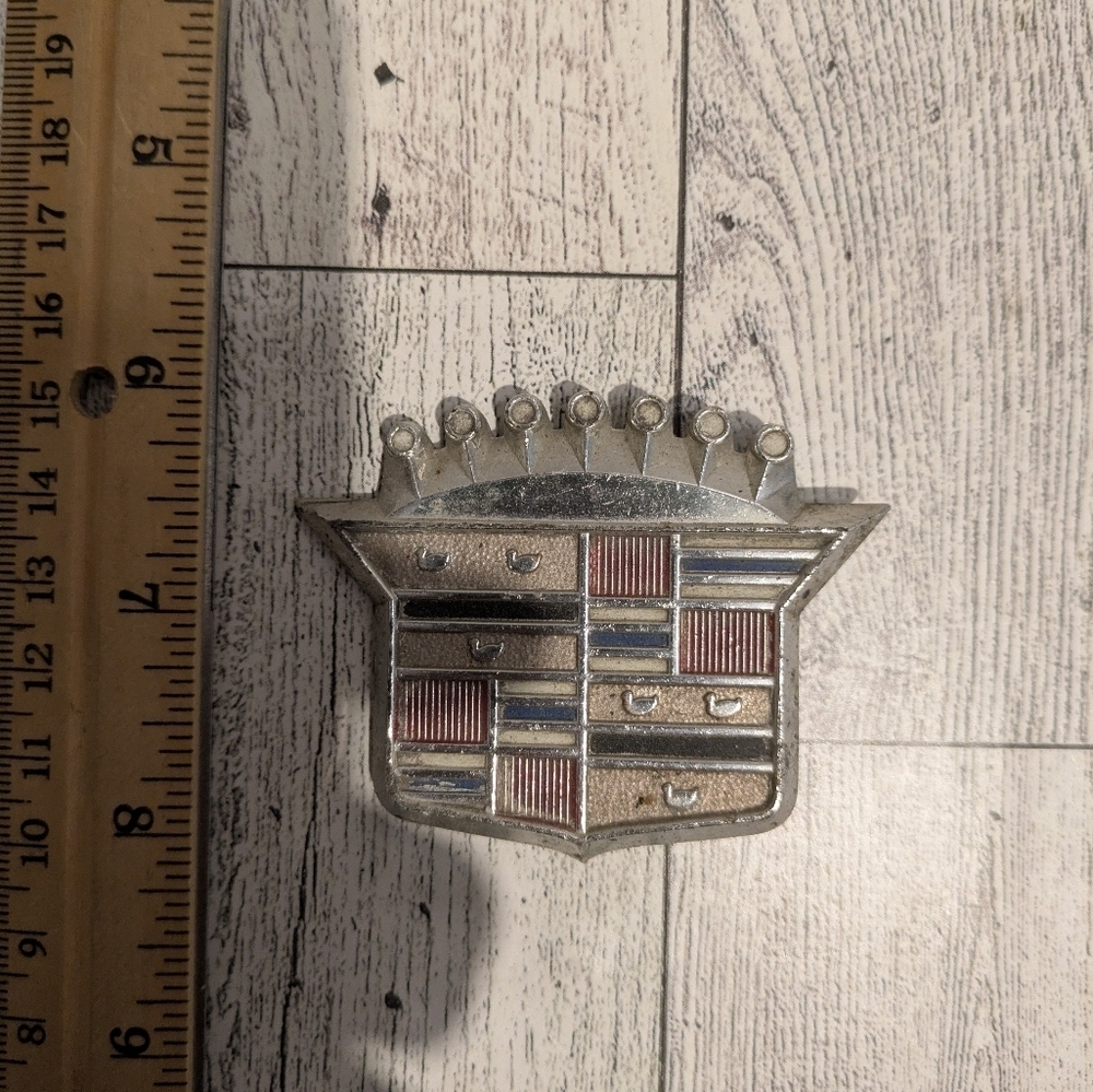 Cadillac Silver and Red Car Emblem